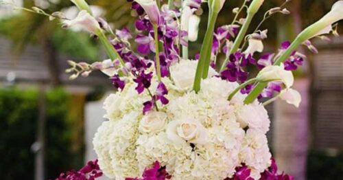 a close-up view of a sophisticated floral arrangement, which could be used as a centerpiece at an event.